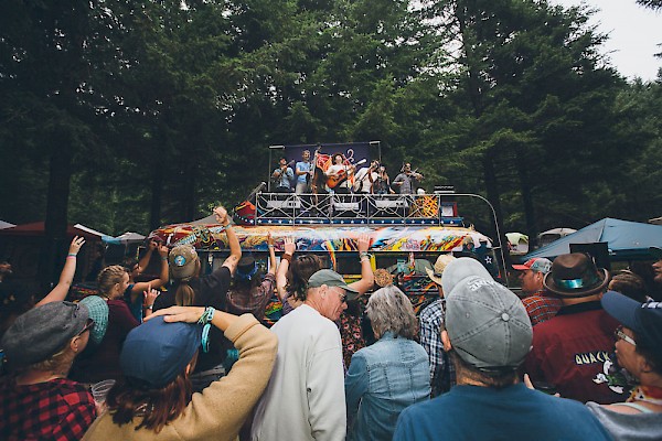 The Brothers Comatose atop the Furthur Bus at Northwest String Summit at Horning's Hideout in 2016—click to see more photos by Jessie McCall