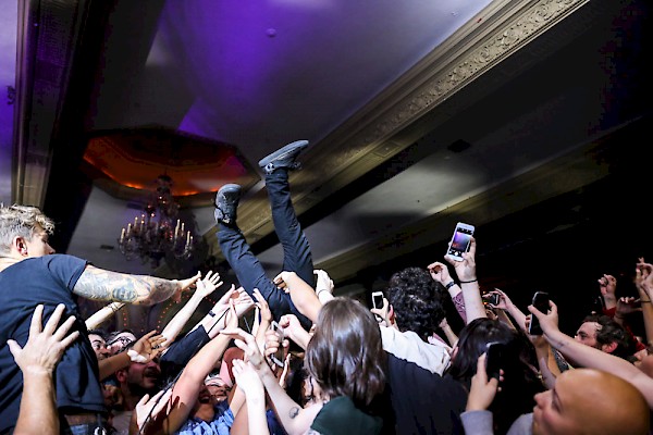 Yannis Philippakis surfing the Crystal crowd—click to see more photos by Sydnie Kobza