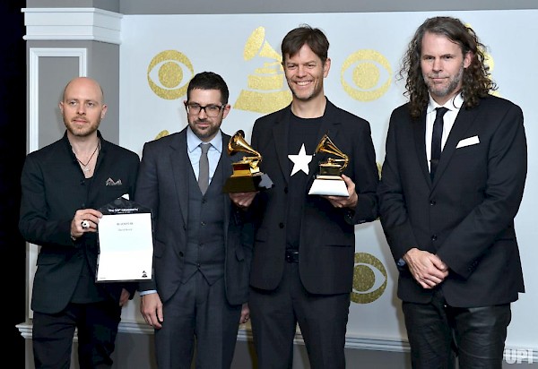 McCaslin (with Lindner, Guiliana and Lefebvre) at the 2017 Grammys, after accepting an award on behalf of David Bowie