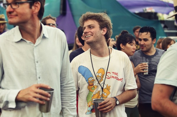 Mac DeMarco enjoying some tunes and his reusable aluminum cup