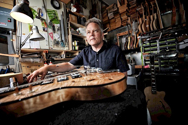 Guitar freak heaven: Koll in his systematically stuffed SW Portland workshop where blocks of wood become beautifully finished musical muses: Photo by Miri Stebivka